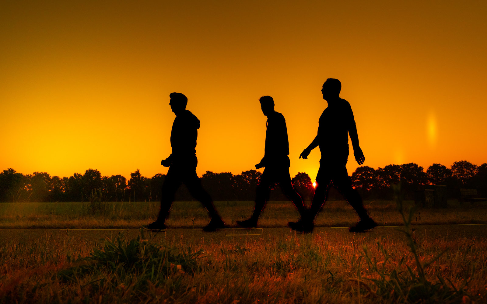 HomeWalkers onderweg opkomende zon